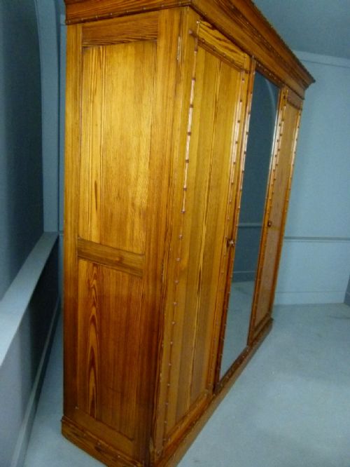 fig 5. Quality Howard & Sons Victorian Pitch Pine Faux Bamboo Triple Wardrobe