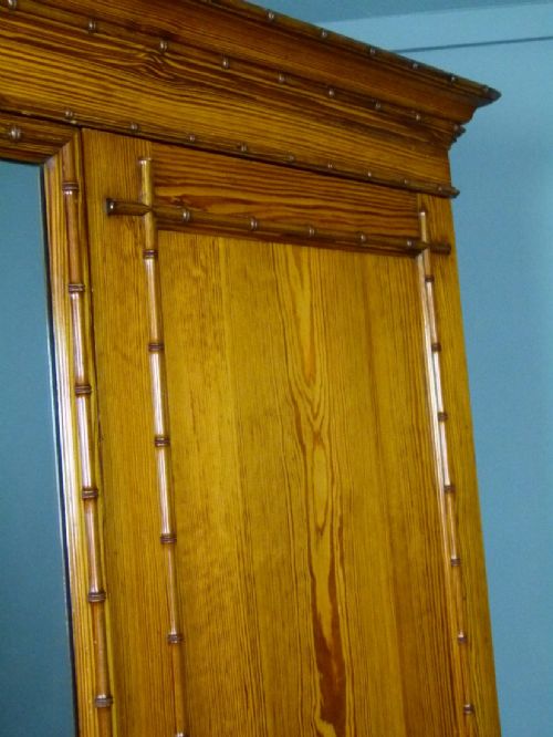 fig 6. Quality Howard & Sons Victorian Pitch Pine Faux Bamboo Triple Wardrobe