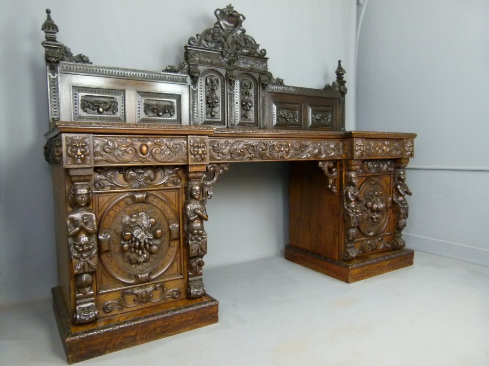 Outstanding Renaissance Revival Carved Oak Sideboard