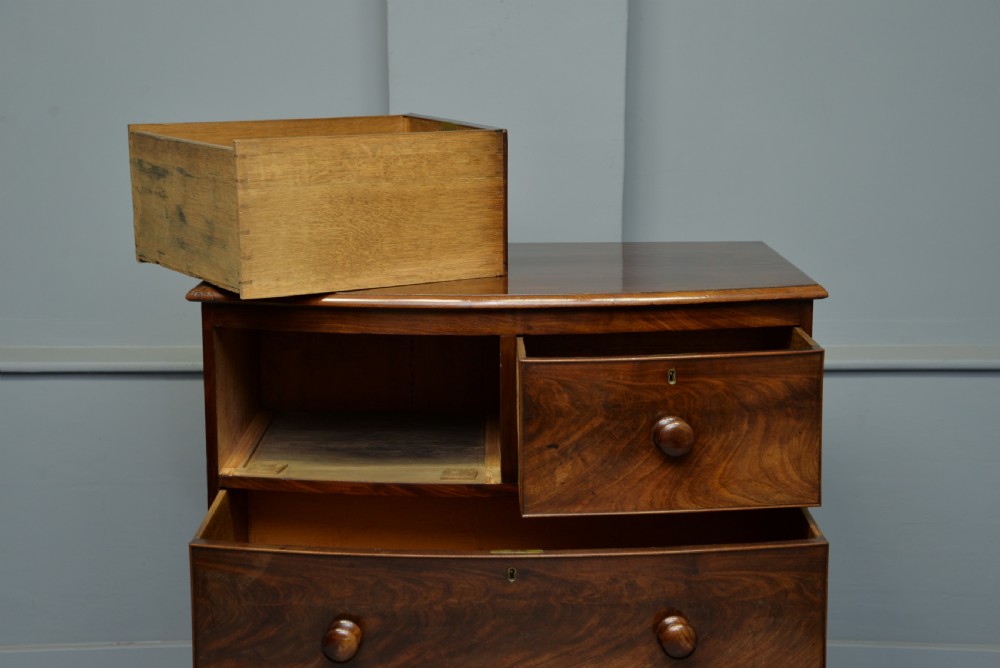 Early Victorian Flame Mahogany Bow-Front Chest Of Drawers  View III