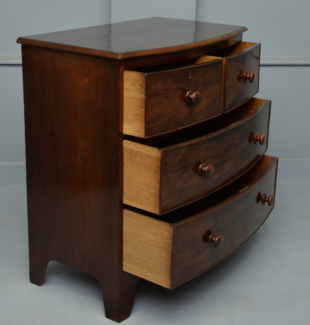 Early Victorian Flame Mahogany Bow-Front Chest Of Drawers  View IV
