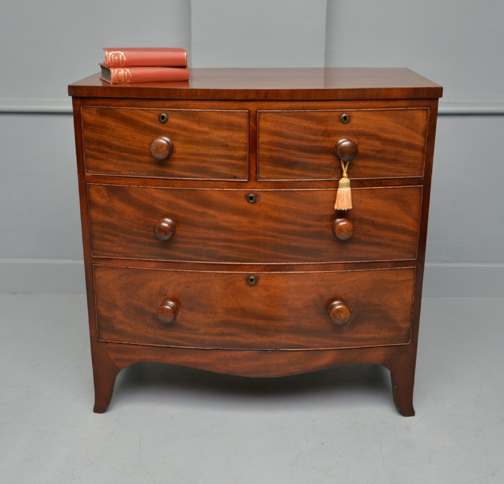 Late Georgian Flame Mahogany Small Bow-Front Chest Of Drawers