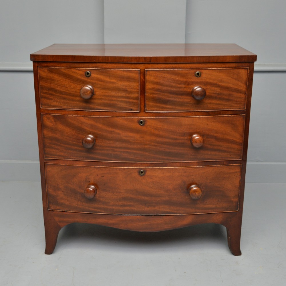 Late Georgian Flame Mahogany Small Bow-Front Chest Of Drawers View III