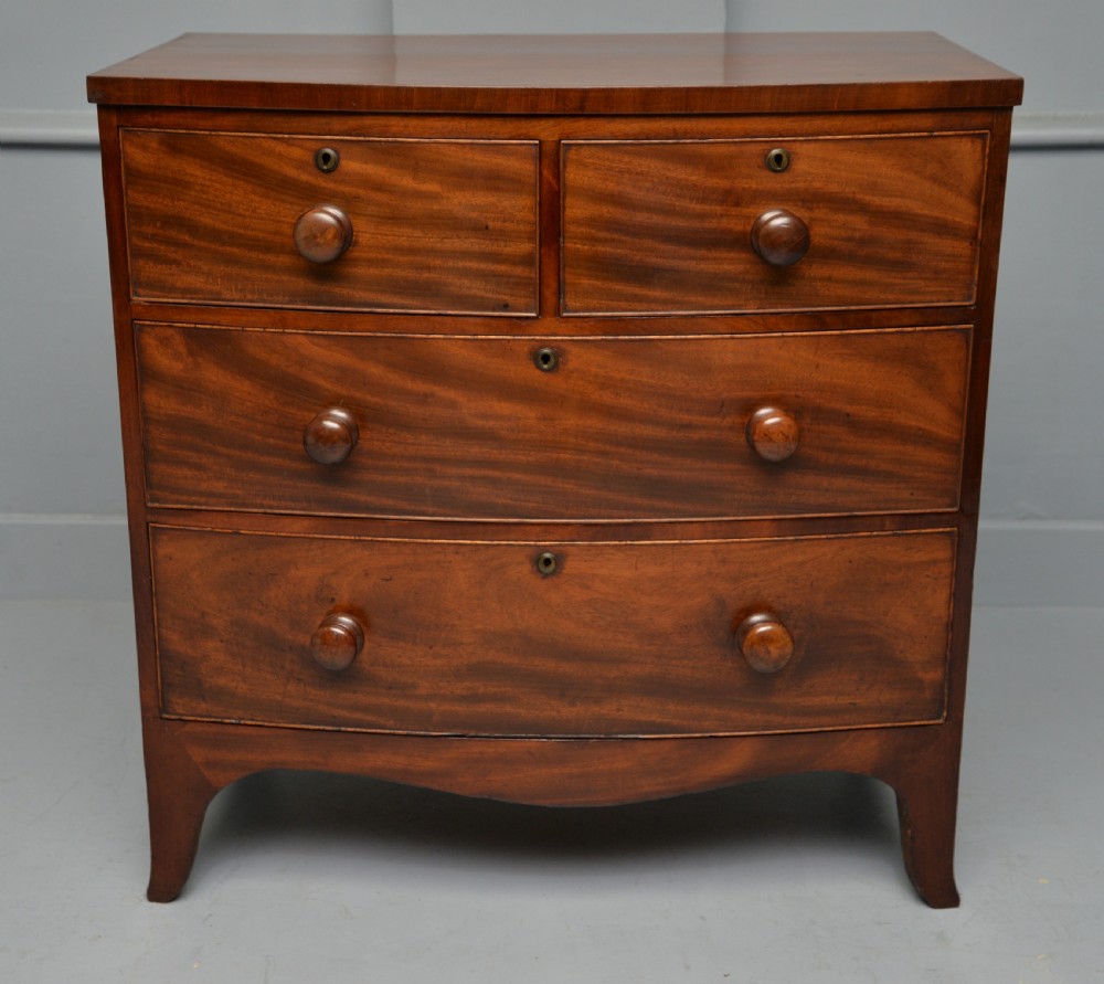 Late Georgian Flame Mahogany Small Bow-Front Chest Of Drawers View IV
