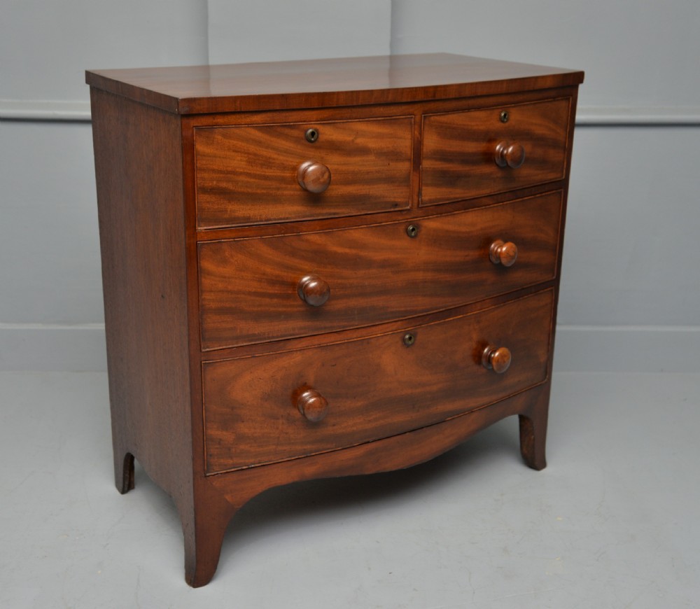 Late Georgian Flame Mahogany Small Bow-Front Chest Of Drawers View VII