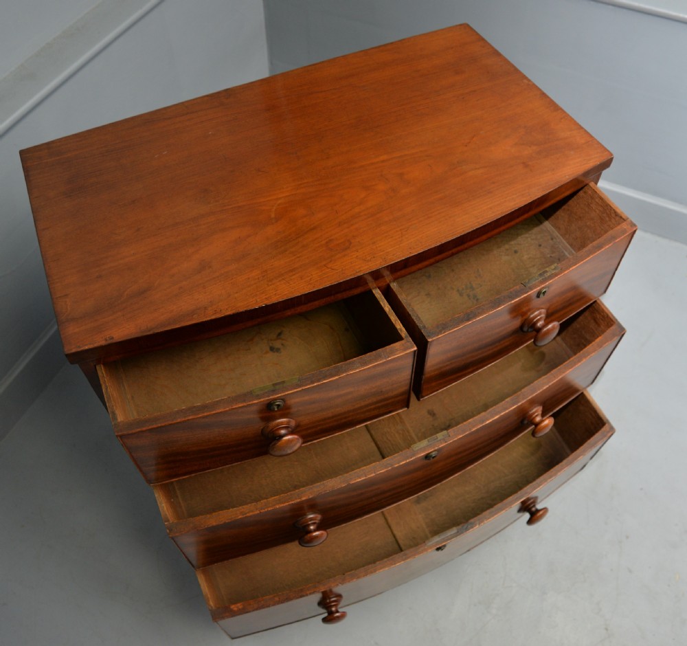 Late Georgian Flame Mahogany Small Bow-Front Chest Of Drawers View XI