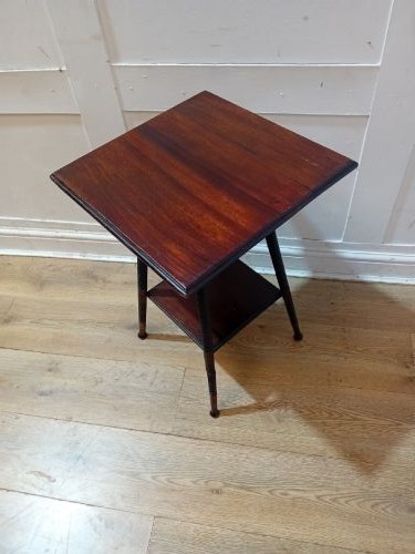 An antique dark wood Arts and Crafts side table featuring turned legs, a square top, and a lower tier shelf. View VIII