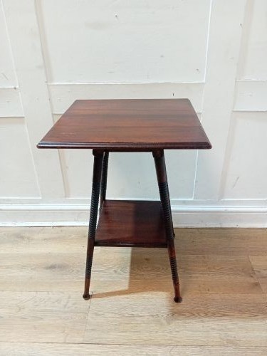 An antique dark wood Arts and Crafts side table featuring turned legs, a square top, and a lower tier shelf. View III