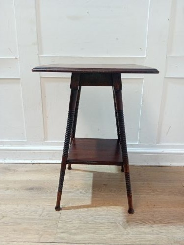An antique dark wood Arts and Crafts side table featuring turned legs, a square top, and a lower tier shelf. View IV