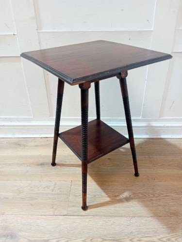 An antique dark wood Arts and Crafts side table featuring turned legs, a square top, and a lower tier shelf. View VII