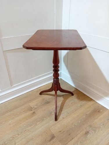A Georgian oak wine table featuring a rectangular top with canted corners supported by a turned central pedestal and tripod base. View III