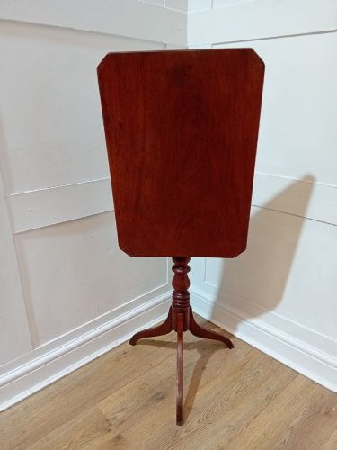 A Georgian oak wine table featuring a rectangular top with canted corners supported by a turned central pedestal and tripod base. View X