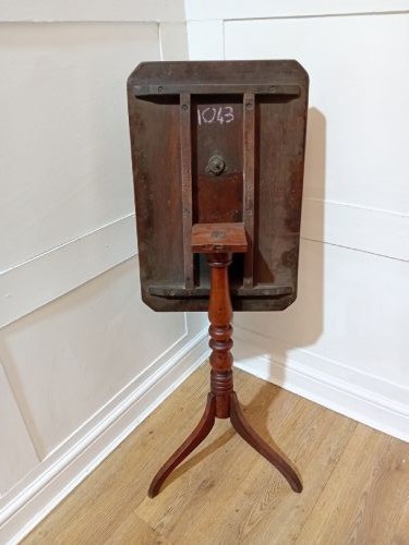 A Georgian oak wine table featuring a rectangular top with canted corners supported by a turned central pedestal and tripod base. View XI
