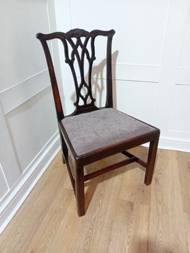 An 18th-century George III mahogany side chair featuring a carved pierced splat back, upholstered drop-in seat, and straight square legs with H-stretcher support. View III