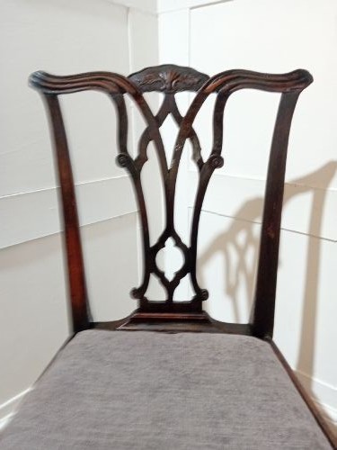 An 18th-century George III mahogany side chair featuring a carved pierced splat back, upholstered drop-in seat, and straight square legs with H-stretcher support. View VII