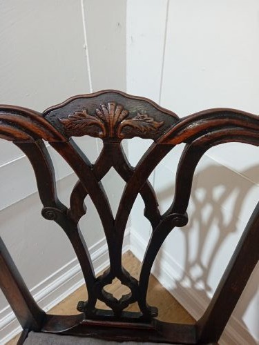 An 18th-century George III mahogany side chair featuring a carved pierced splat back, upholstered drop-in seat, and straight square legs with H-stretcher support. View XI
