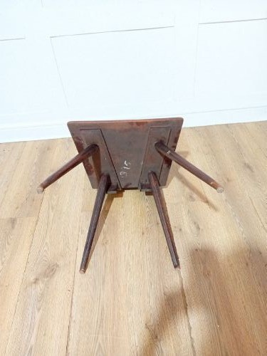 An antique Bavarian folk art wooden side chair featuring a carved cartouche backrest with a central cutout, a slab seat with visible joinery, and splayed legs. View IX