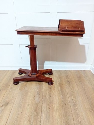 An antique Victorian mahogany reading table featuring a dual tilting ratcheted top on a turned pedestal column and quadripartite base. View XIV