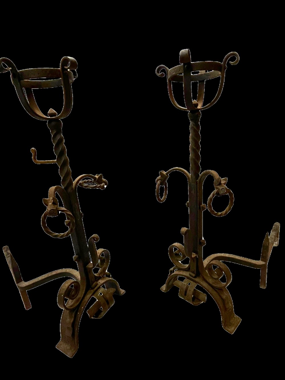 Pair of antique hand-forged wrought iron firedogs featuring barley twist stems, cresset basket tops, scrolled feet, and rear log rests. View II