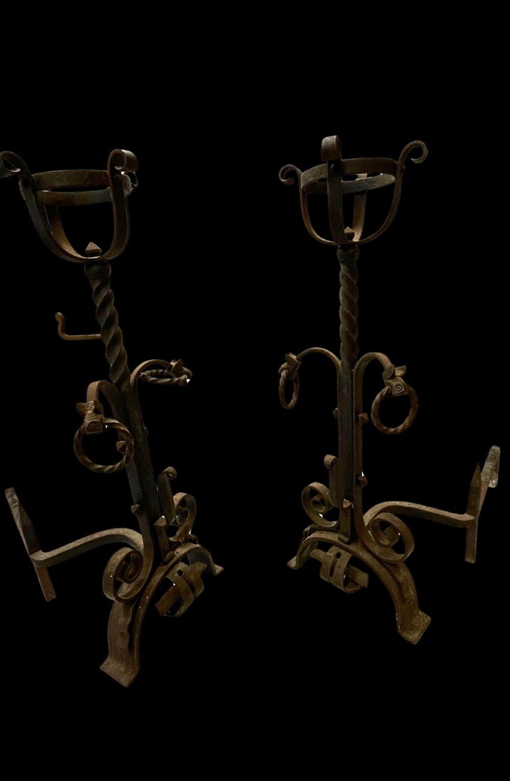 Pair of antique hand-forged wrought iron firedogs featuring barley twist stems, cresset basket tops, scrolled feet, and rear log rests. View III
