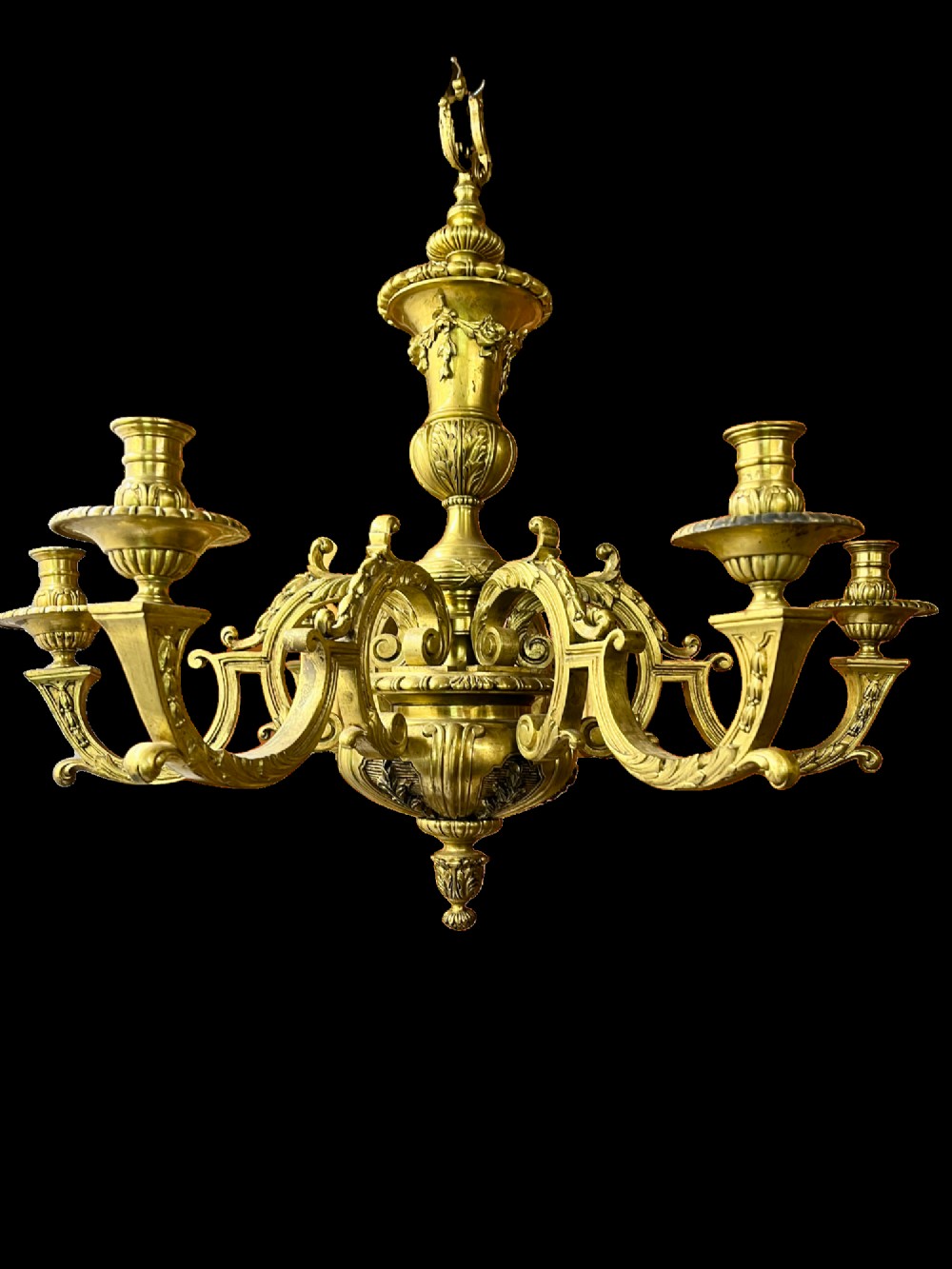 A Georgian style cast brass chandelier featuring a central urn-shaped column, ornate scroll arms, and candle-style sconces with acanthus leaf decoration. View II