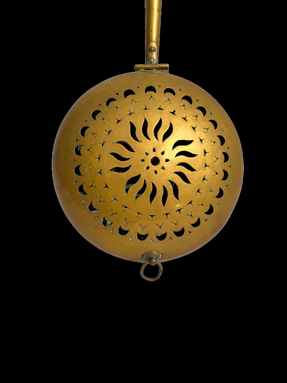 An antique English brass bed warming pan featuring a pierced decorative lid and a turned wooden handle. View IV
