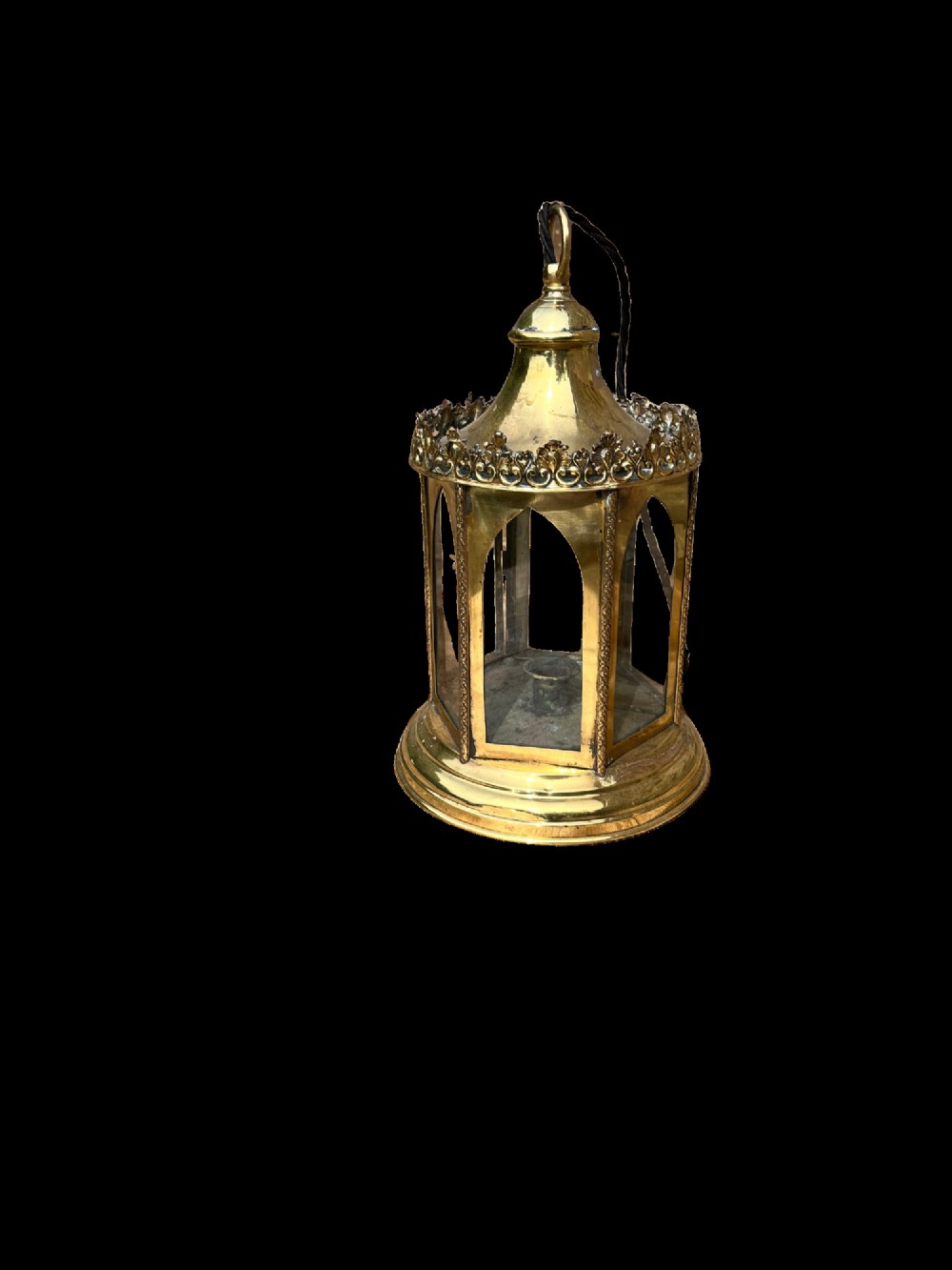 An electrified antique brass hall lantern featuring arched glass panels, a pierced top gallery, and a domed canopy with hanging loop. View II