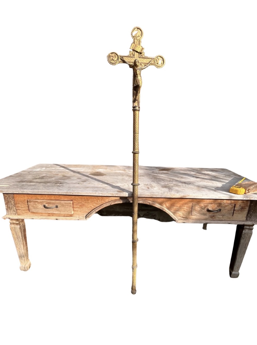 A cast gilt brass processional crucifix featuring the figure of Christ surrounded by circular medallions depicting the Evangelist symbols. View II