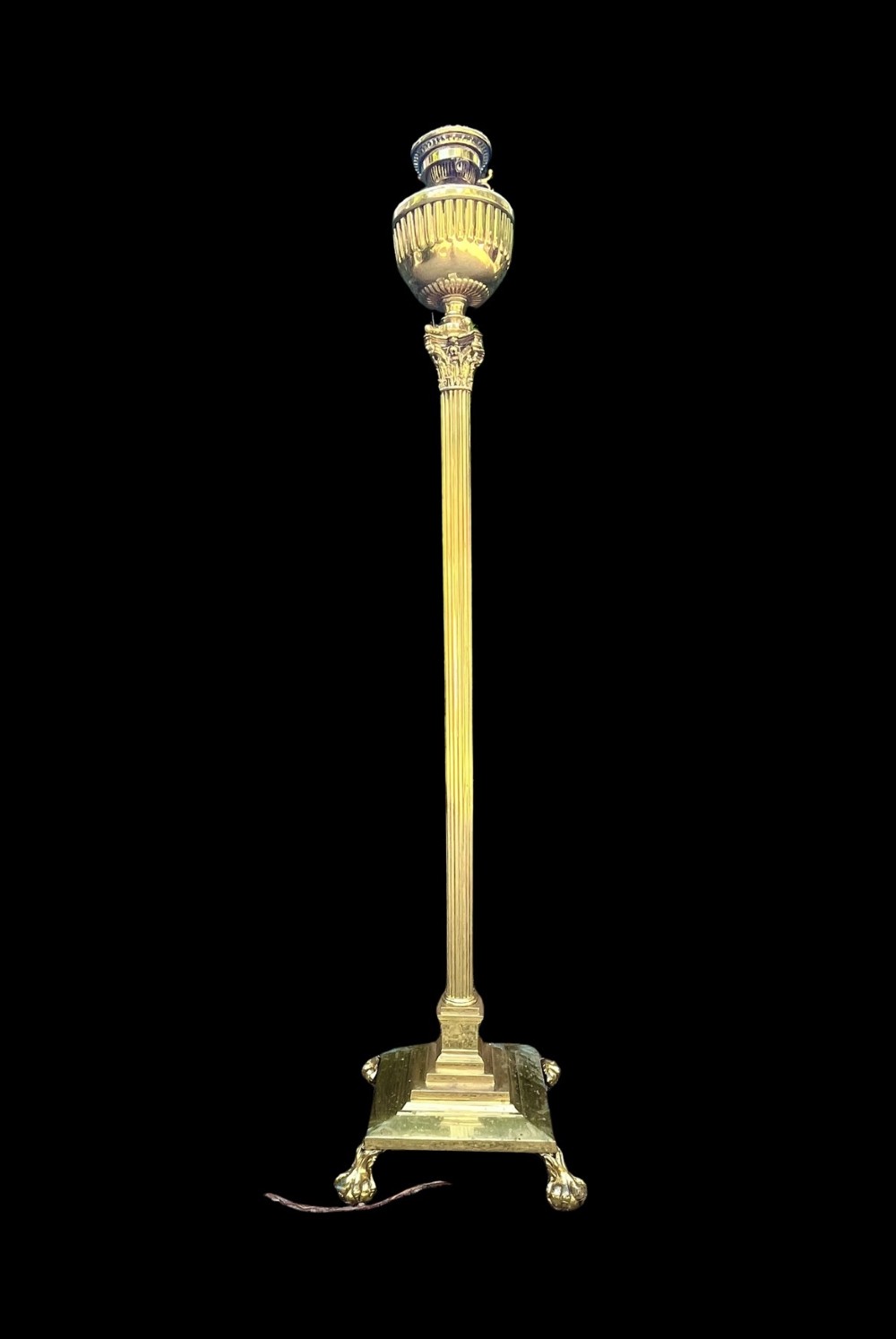 A solid brass floor lamp featuring a fluted Corinthian column stem, an urn-shaped reservoir top, and a stepped square base supported by claw feet. View II