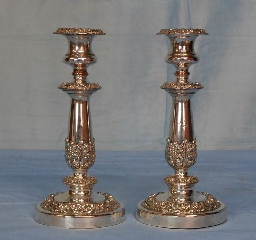 A pair of Sheffield silver plated candlesticks