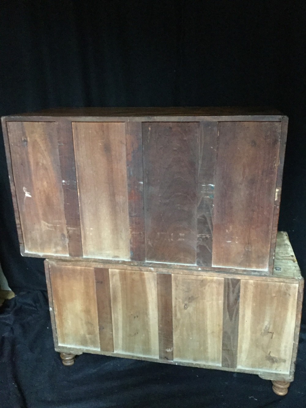 A rectangular mahogany campaign secretaire chest featuring multiple drawers, a fall-front writing compartment, and recessed brass pull handles. View IX