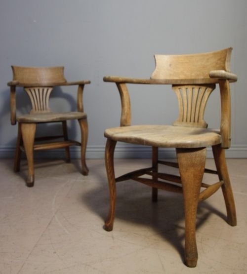 Pair of English Antique Oak Captains Chairs