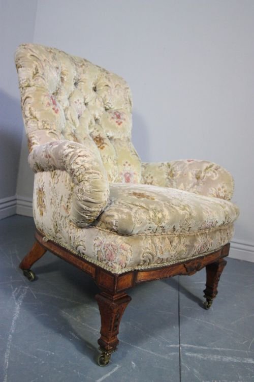 Shapely Antique Upholstered Armchair by 'Gillows'.