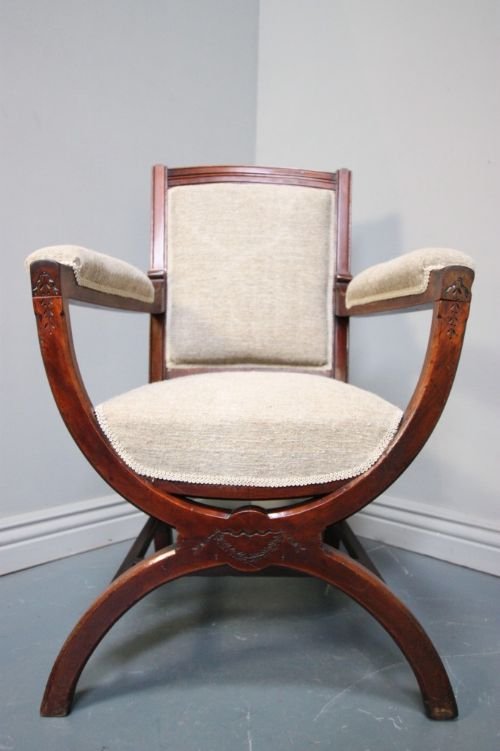 fig 1. Antique Upholstered X Frame Walnut Armchair
