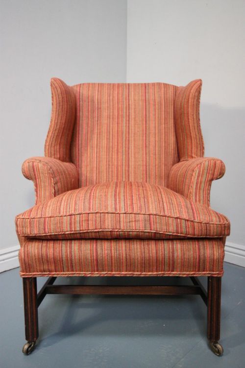 fig 1. 19th Century Antique Upholstered Wing Armchair.