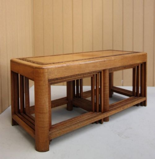 fig 1. 1920's Nest of Seven Camphor Wood Coffee Tables.
