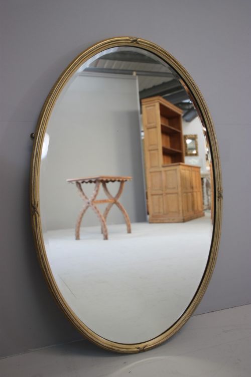 Late 19th Century Simple Antique Oval Gilt Mirror