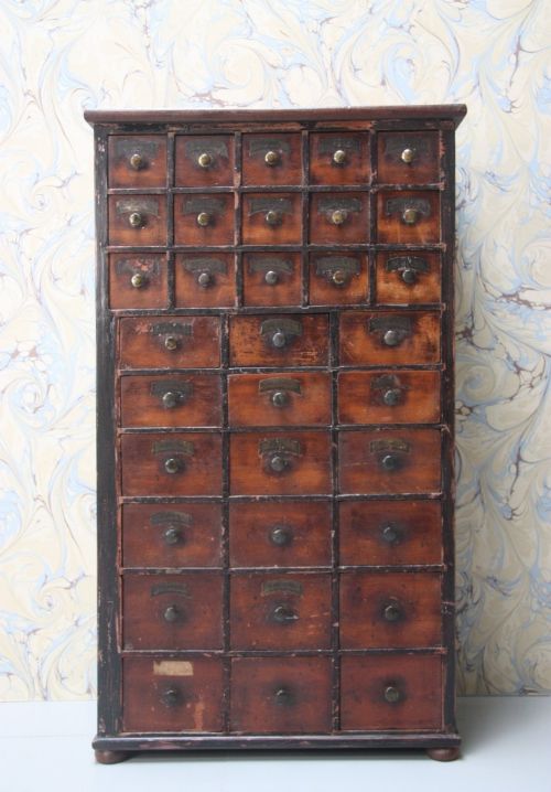 fig 1. Wonderful Bank of Antique Seed Drawers