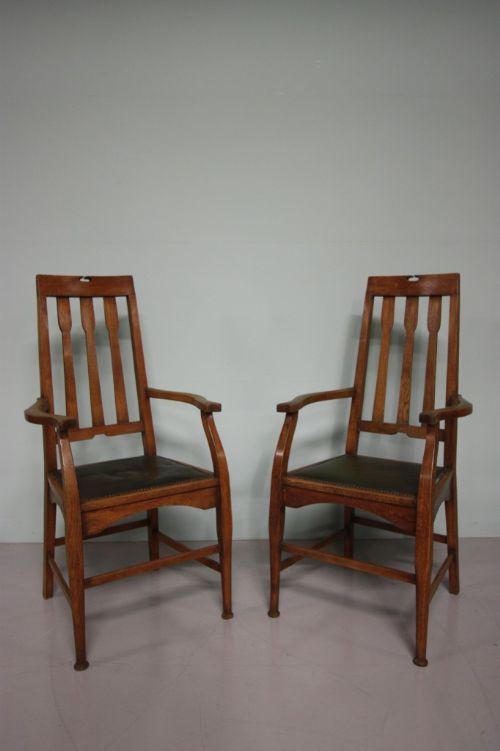 Pair of Antique Oak Chairs by E.a.taylor.