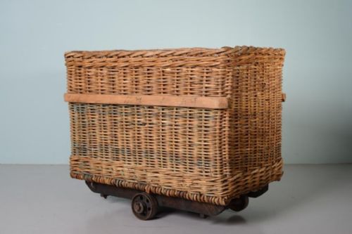 Antique Wicker Mill Basket on Cast Iron Wheels