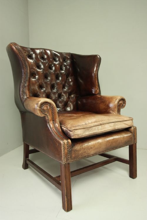 Large Edwardian Antique Leather Wing Armchair.