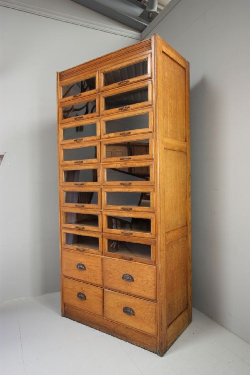 fig 1. English 1930's Oak Haberdashery Shirt Cabinet.