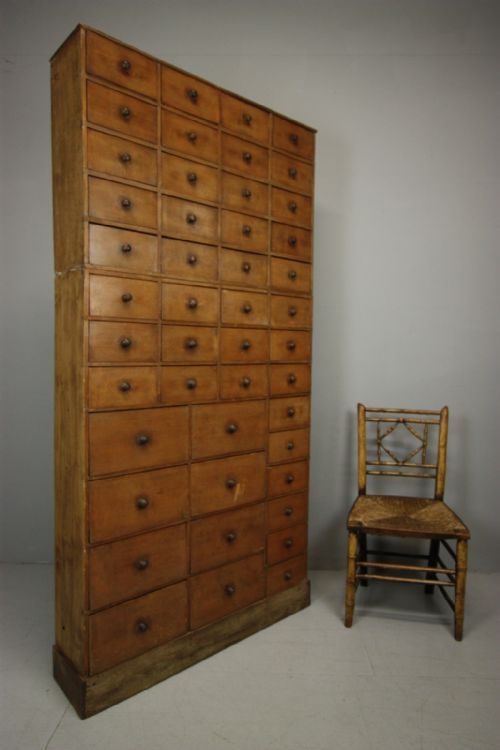 Tall 19th Century Antique Bank of Drawers in Paint.