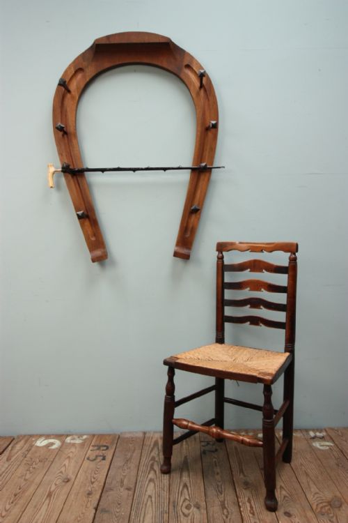 Large Antique Walnut Horseshoe Shaped Rack.