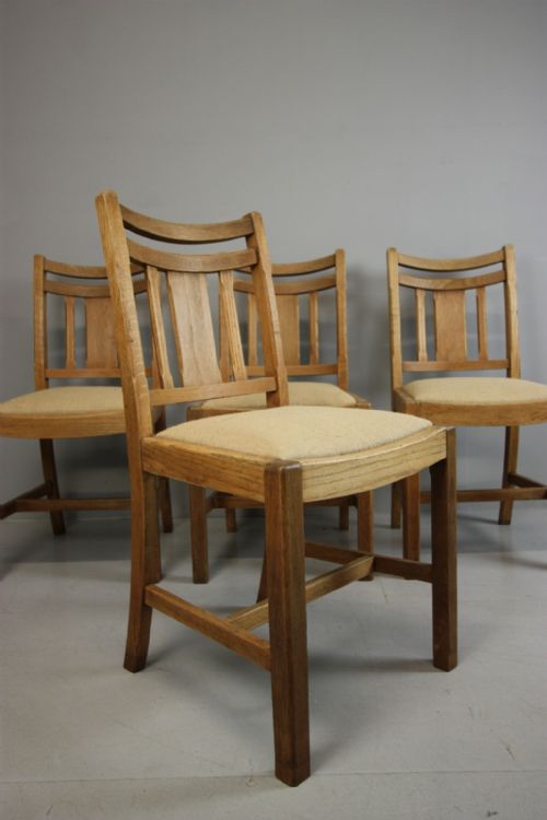 Set of Four Heals Dining Chairs in Oak.