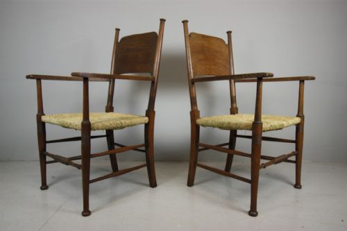 Pair of Antique William Birch Oak Armchairs.