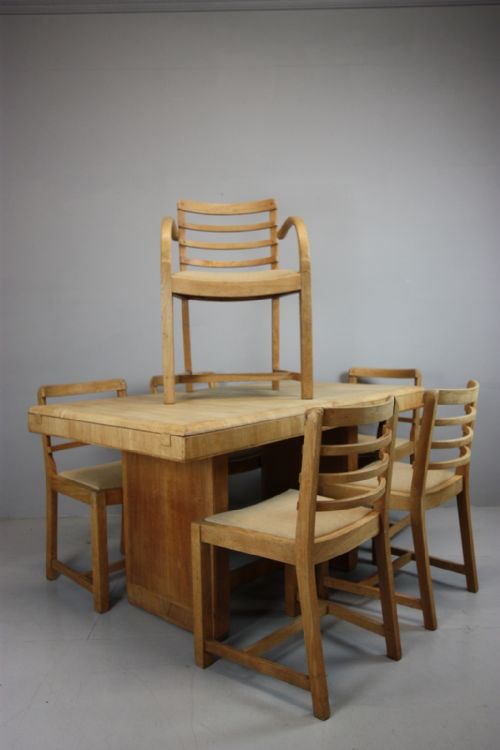 fig 1. A super quality English oak dining suite by Heals of London.