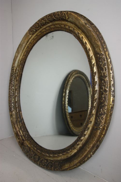 Beautiful Pair of Antique Oval Silver Gilt Mirrors.