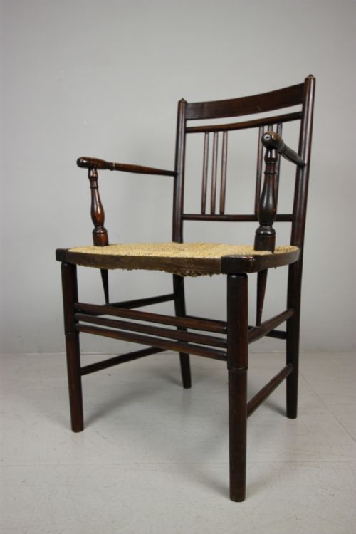 Morris & Co Antique Sussex Armchair.
