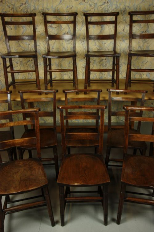 Set of Twelve Antique Chapel Dining Chairs.